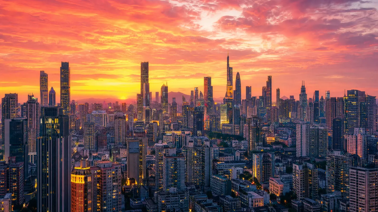 Papier peint panoramique skyline urbaine coucher de soleil